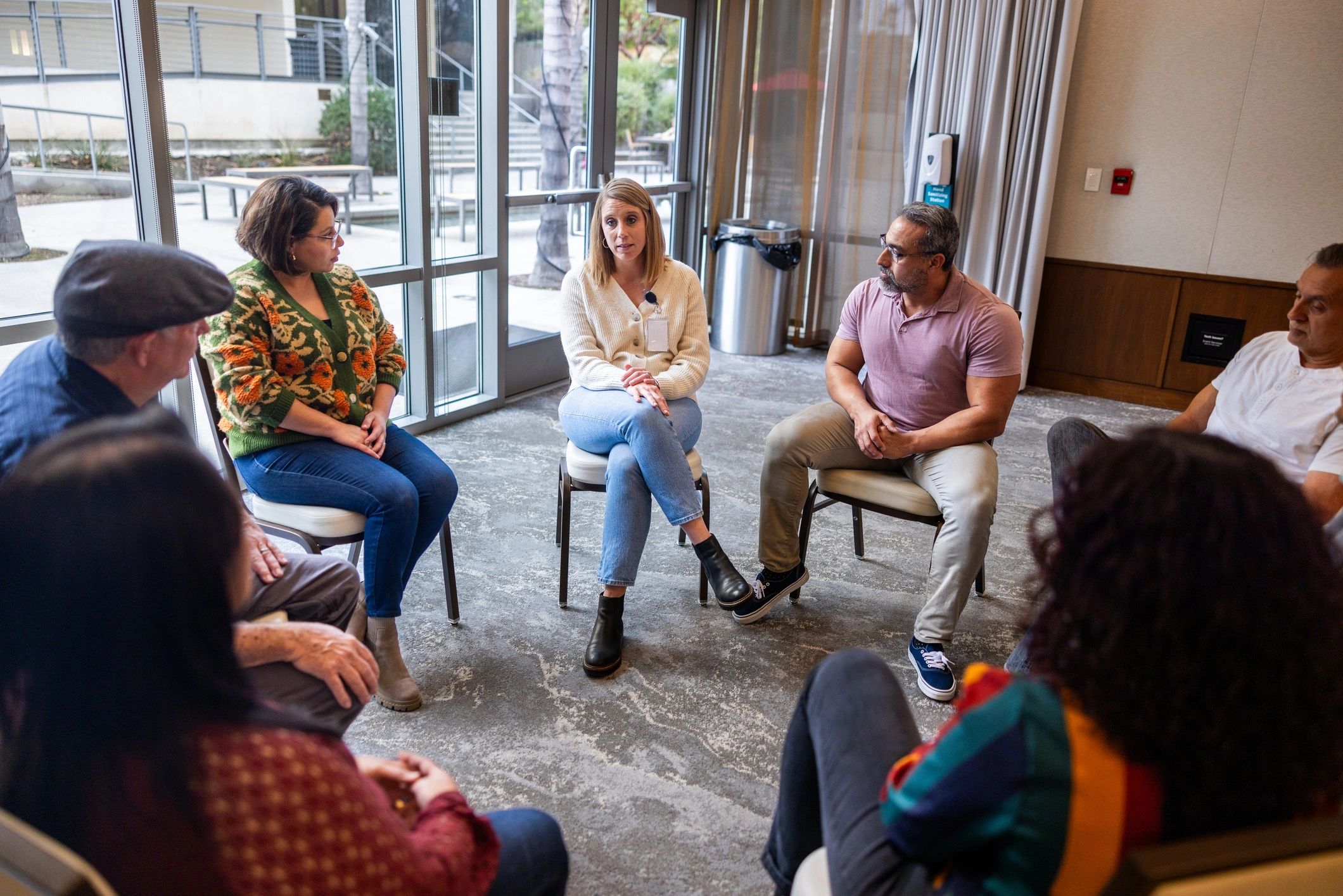 Small group discussion in a modern meeting space