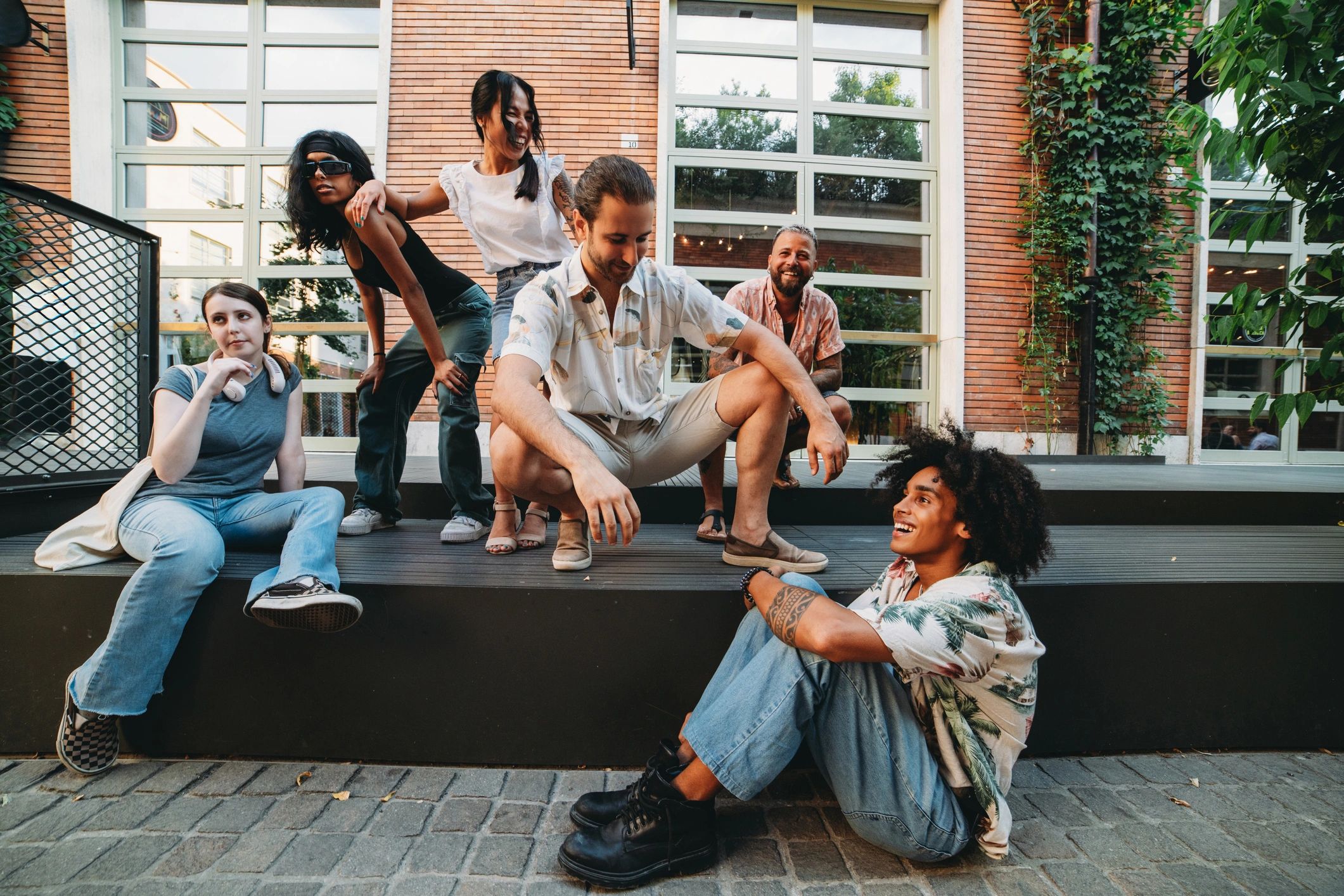South Asian LGBTQ+ youth and allies connecting in a supportive community setting
