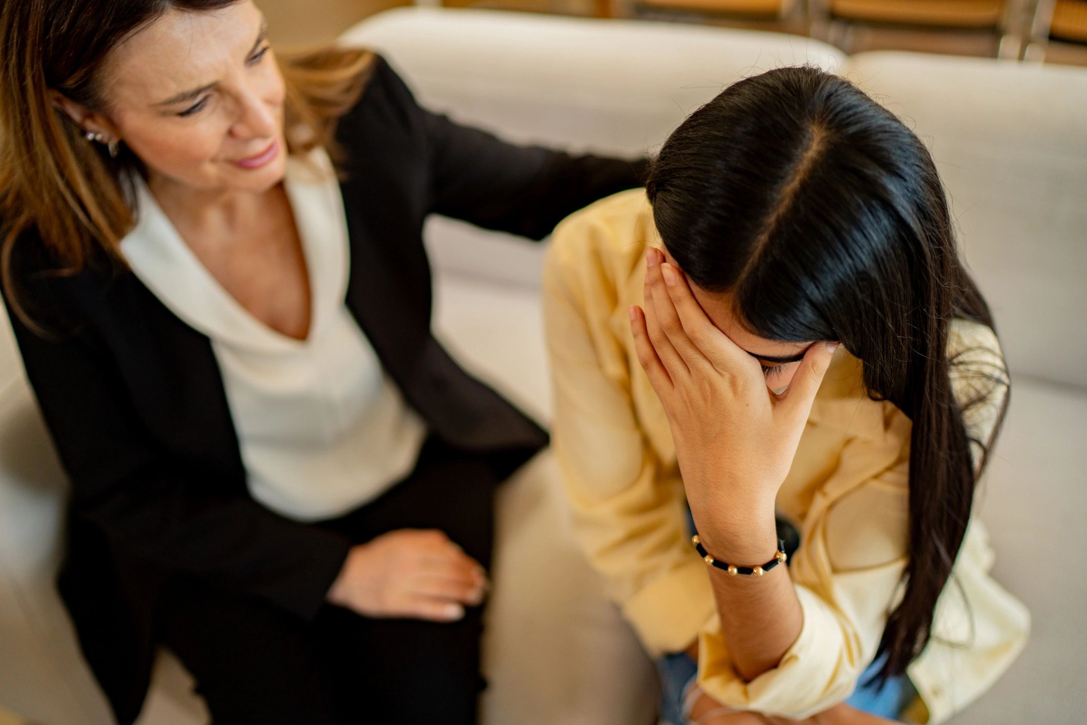 Therapist offering supportive conversation in a calm setting